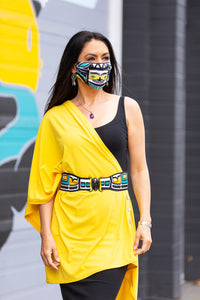 Model wearing a Chloe Angus Design Bamboo Button Wrap in Yellow