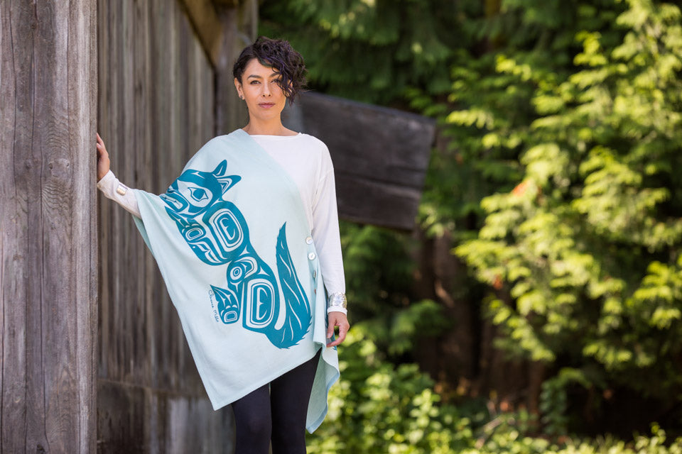 This stunning Wolf Spirit Wrap is a collaboration between our own Chloë Angus and talented Haida artist, Clarence Mills
