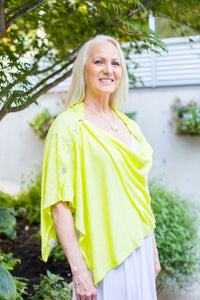 Model wearing a Chloe Angus Design Linen Button Wrap in Chartreuse