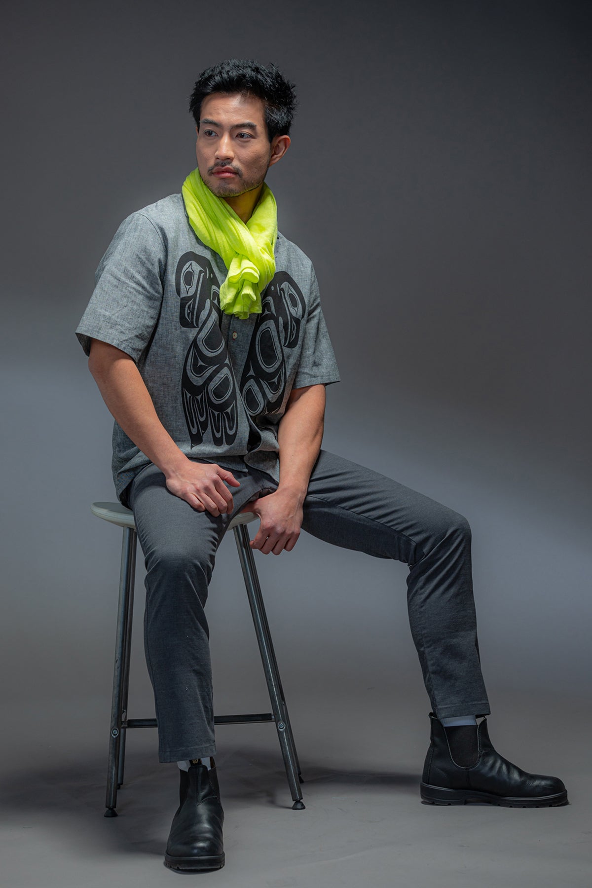 Model wearing a Chloe Angus Design Linen Button Wrap in Chartreuse