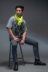 Model wearing a Chloe Angus Design Linen Button Wrap in Chartreuse