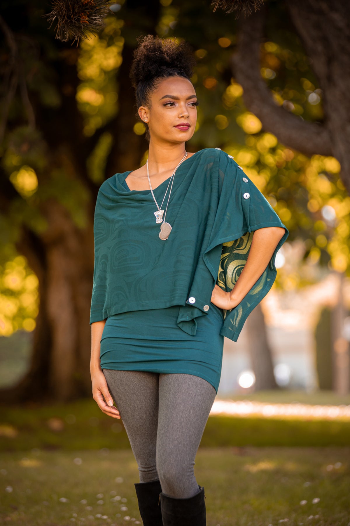 Model wearing a Chloe Angus Design Bamboo Button Wrap with Modern Burnout print by Clarence Mills