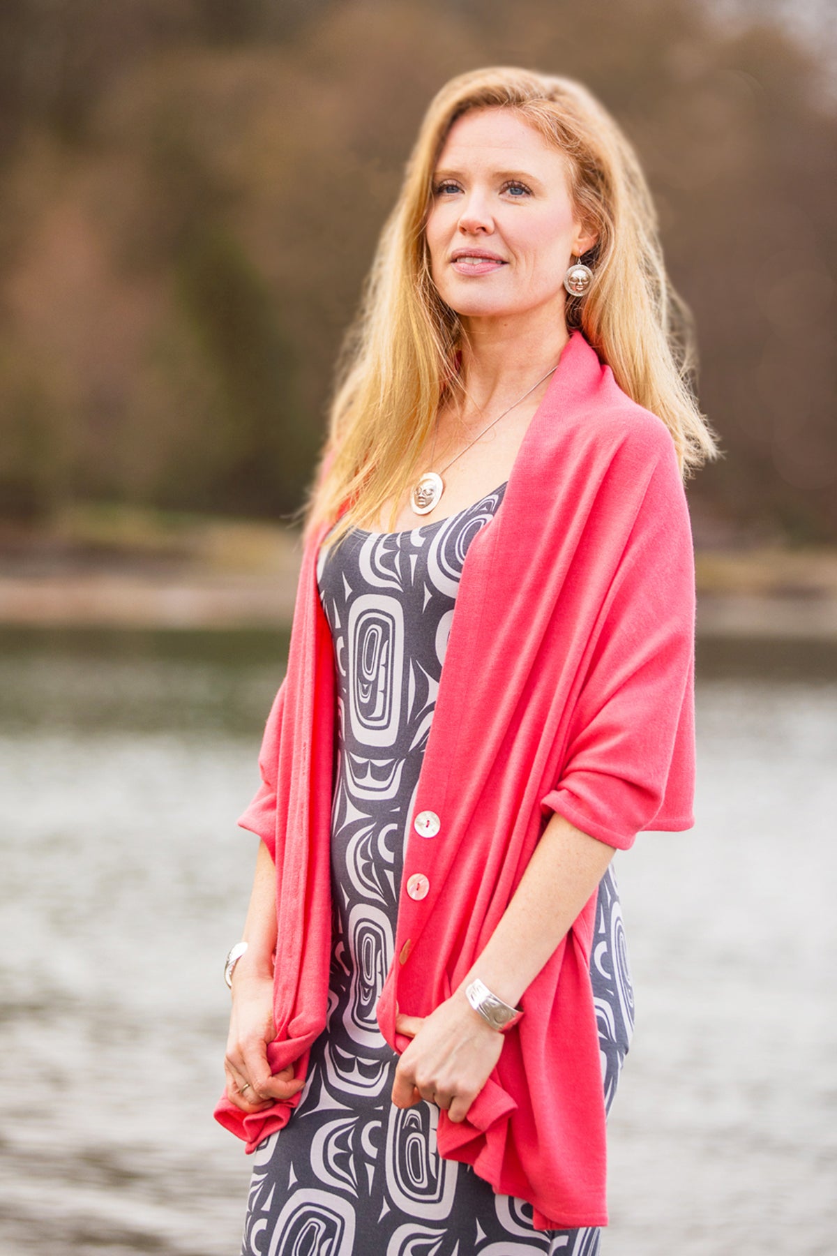 Model wearing a Chloe Angus Design Wool Button Wrap in Honeysuckle