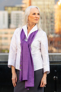 Model wearing a Chloe Angus Design Wool Button Wrap in Hyacinth