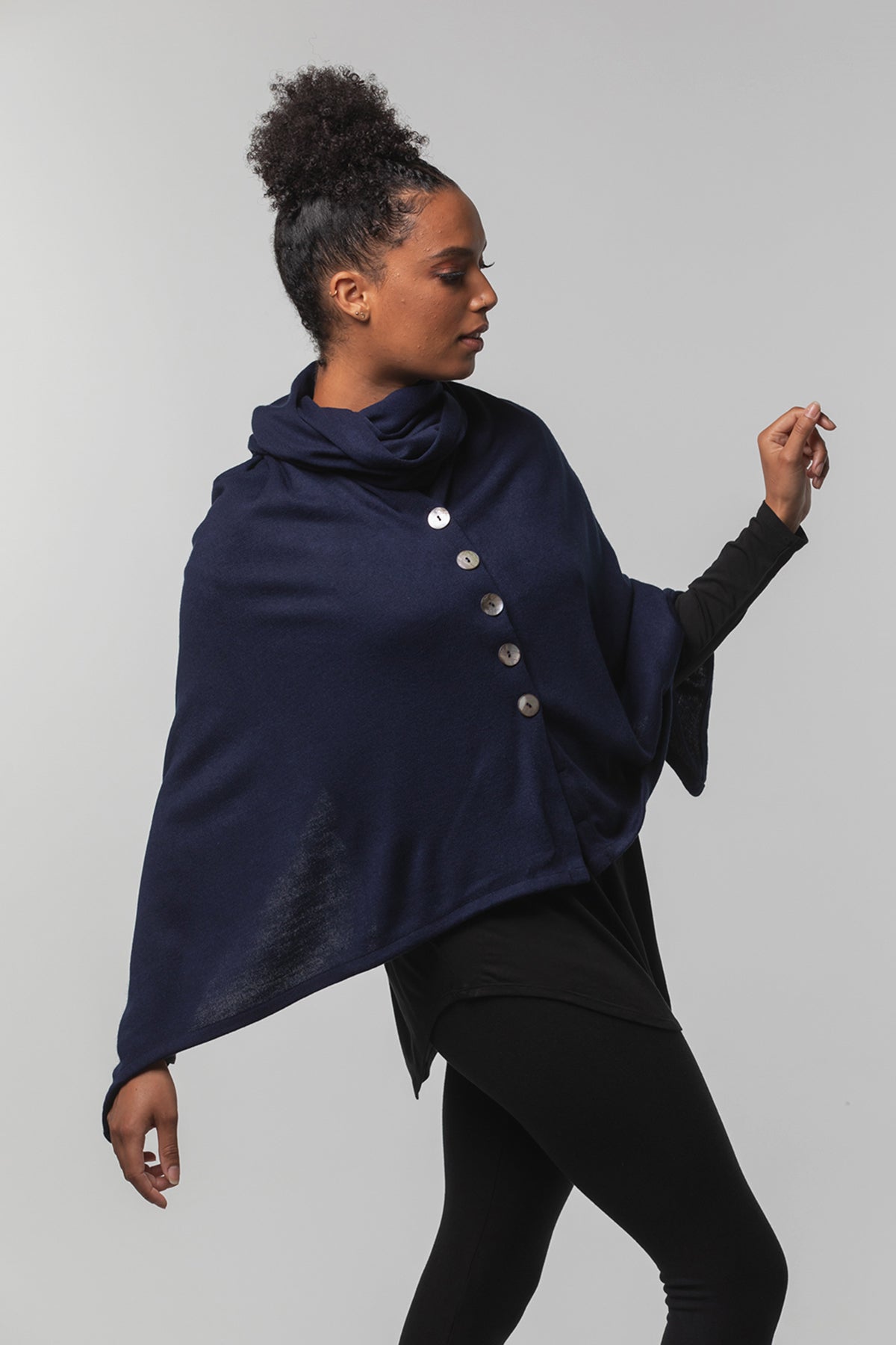 Model wearing a Chloe Angus Design Wool Button Wrap in Ink