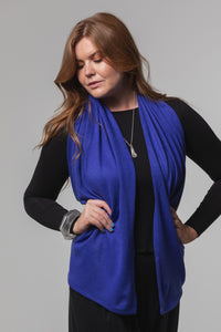 Model wearing a Chloe Angus Design Wool Button Wrap in Pacific