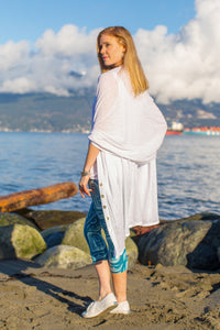 Model wearing a Chloe Angus Design Linen Button Wrap in White